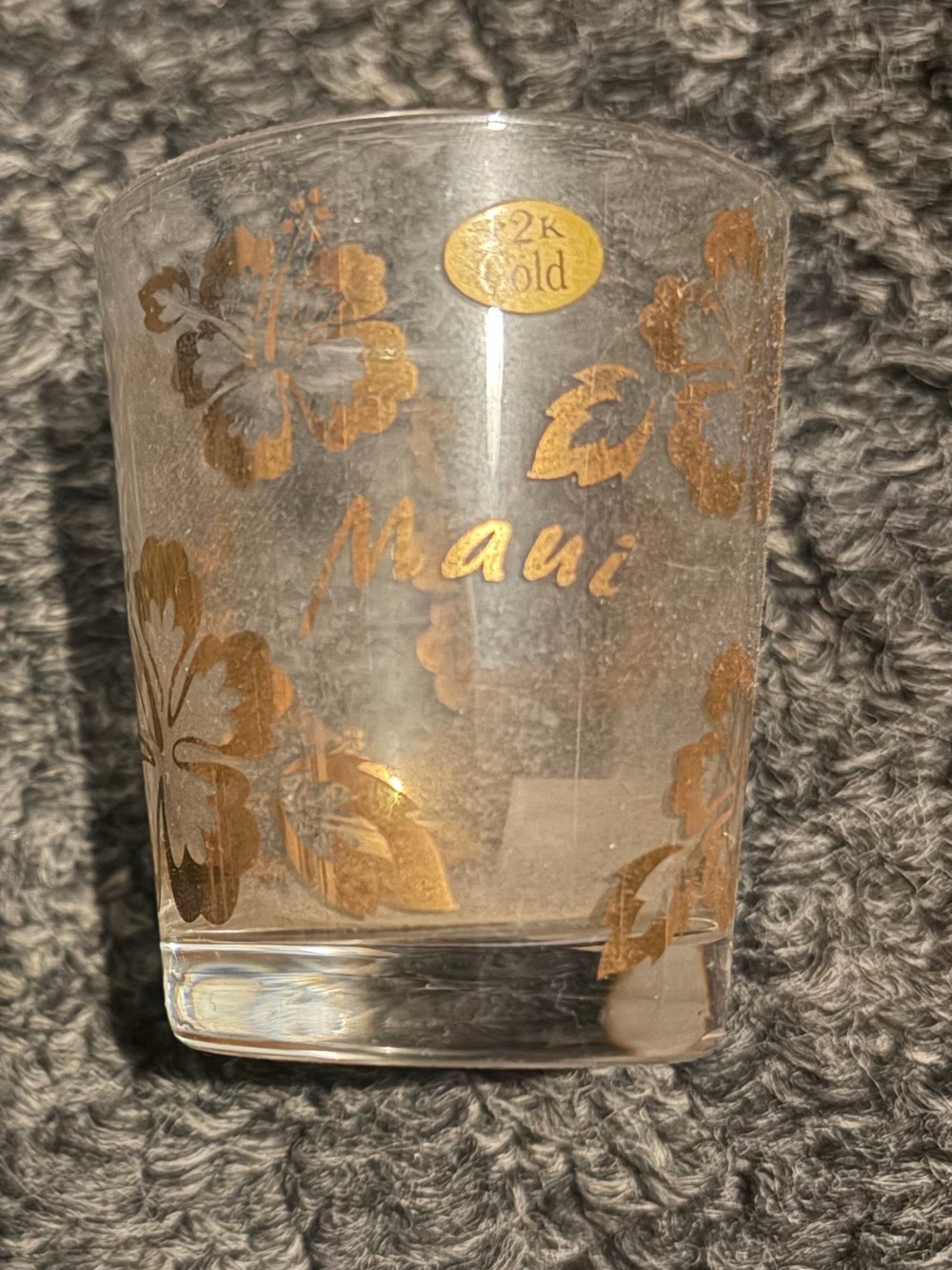 Maui Hawaii 12k gold flower shot glass.